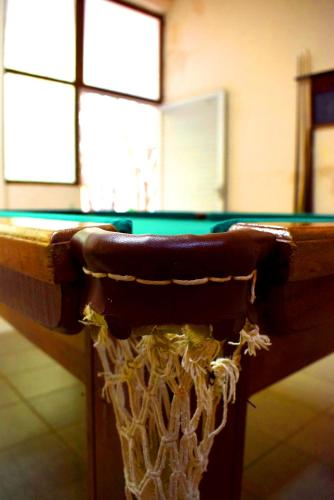 a basketball hoop with a net in a gym at Hotel Moinho de Pedra in Serra Negra