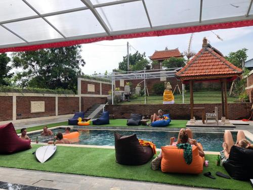 Imagen de la galería de Oka's Guest House Canggu, en Canggu