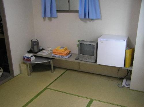 Kuchyň nebo kuchyňský kout v ubytování Ikawa Ryokan