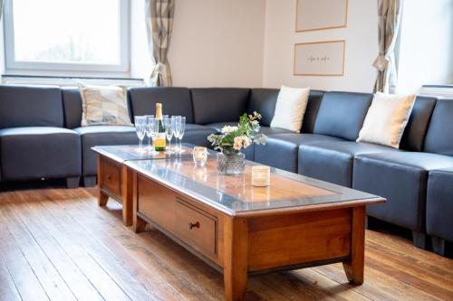 Ein Sitzbereich in der Unterkunft Zythogite Appartement 8 personnes avec jardin, bbq