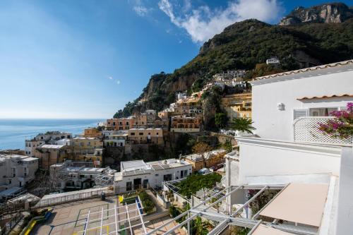a view of the city of positano and the ocean at Villa Yiara in Positano