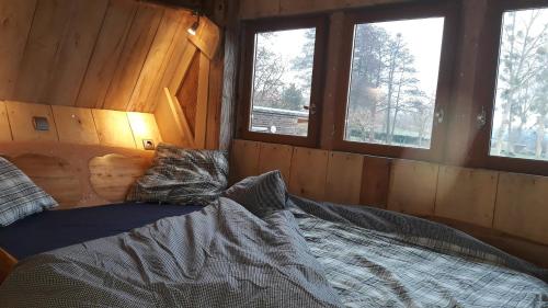 מיטה או מיטות בחדר ב-Cabanes de moon