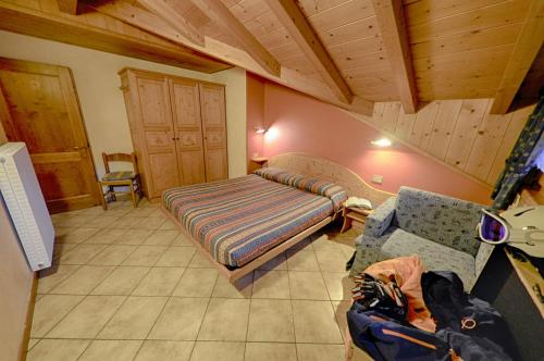 Una cama o camas en una habitación de Rosengarden Alpine Residence