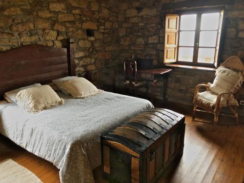Ένα ή περισσότερα κρεβάτια σε δωμάτιο στο La Casa del Chileno