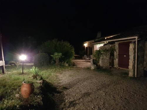a house at night with a street light next to it at Villa Eden Vert in Fayence