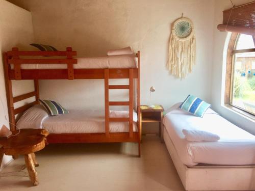 Ein Bett oder Betten in einem Zimmer der Unterkunft Conviento de Lobos