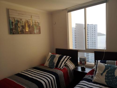 Postel nebo postele na pokoji v ubytování Departamento Vista Herradura