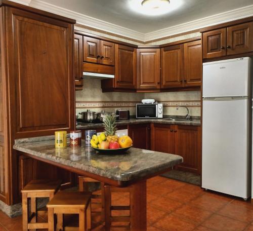 Kuchyň nebo kuchyňský kout v ubytování Apartamentos El Jablito