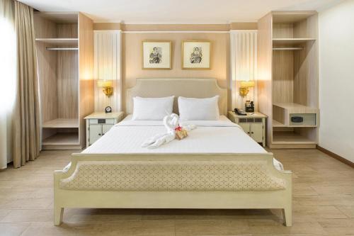 Lova arba lovos apgyvendinimo įstaigoje Golden Prince Hotel & Suites