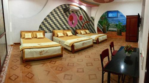 En eller flere senger på et rom på 117 Bà Triệu Homestay