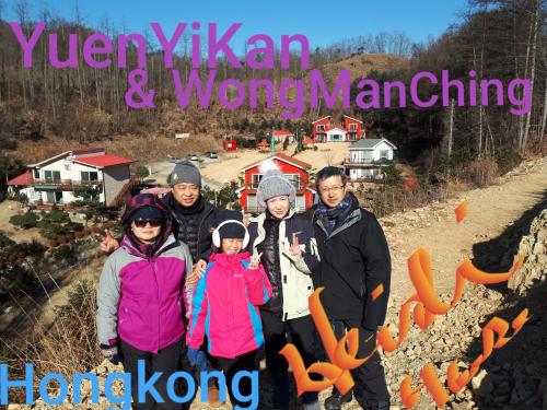 a group of people posing for a picture on a mountain at Heidi Korea in Hongcheon