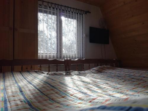 Kuća za odmor Arsenijević房間的床