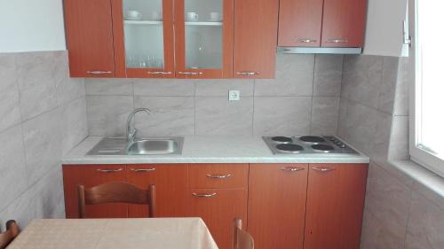 Η κουζίνα ή μικρή κουζίνα στο Apartment for Holidays in Pula