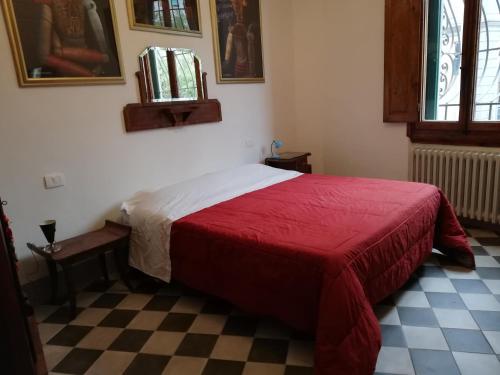 En eller flere senge i et værelse på la ginella la casa vintage