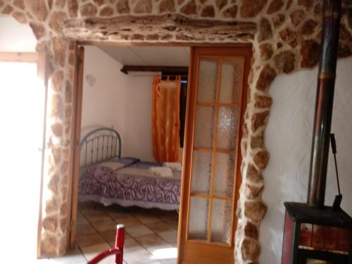 En eller flere senge i et værelse på Alghero - Grotte di Nettuno cortes
