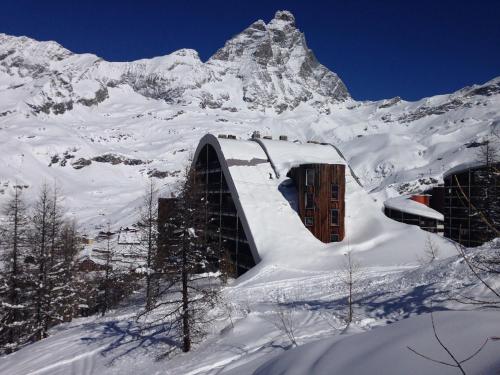 House Cervinia Apartments v zimě