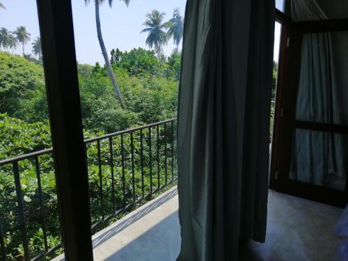 Balkoni atau teres di Green Almond Hotel
