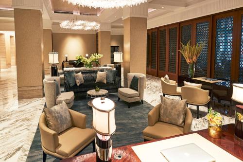 Et opholdsområde på The Capitol Kempinski Hotel Singapore