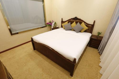 Кровать или кровати в номере Diamond Pearl Hotel