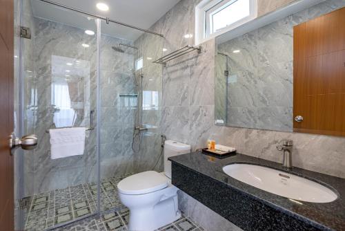 Ein Badezimmer in der Unterkunft Emerald Central