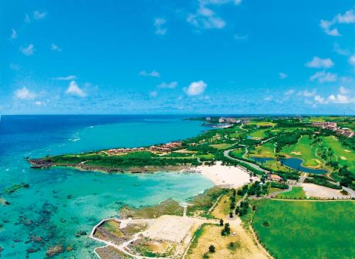 an aerial view of a beach and the ocean at The Shigira in Miyako Island