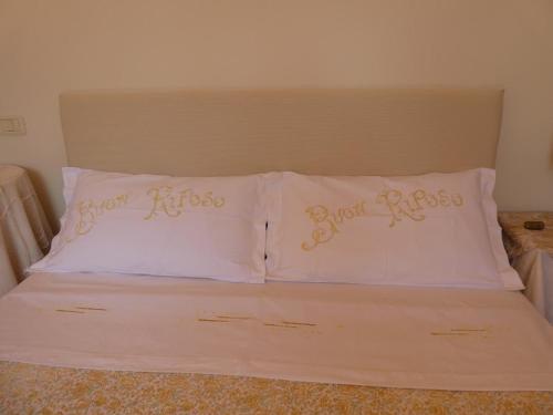 Ein Bett oder Betten in einem Zimmer der Unterkunft casa Giuliana