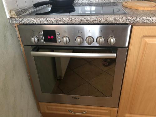 Dapur atau dapur kecil di Villapark apartments 201, Lipno