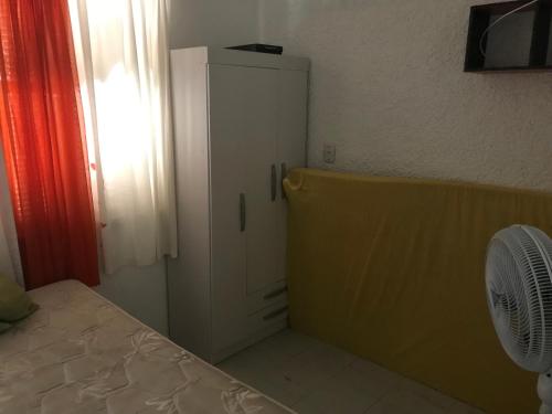מיטה או מיטות בחדר ב-Ap da Sepé excelente localização