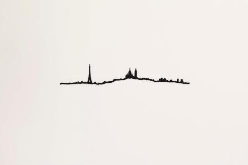 an illustration of a city skyline at Hôtel Eiffel Saint Charles in Paris