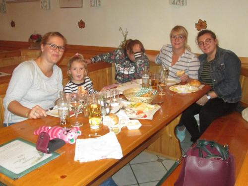 a group of people sitting at a table at Vermieterei in Oberwölbling