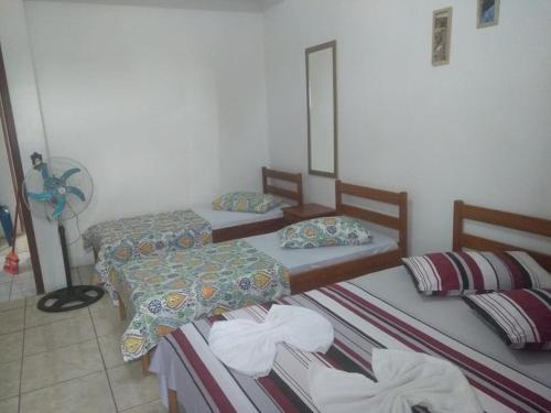 Katil atau katil-katil dalam bilik di Tony Hotel