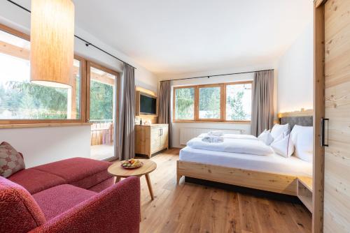 Llit o llits en una habitació de Hotel Trattlerhof