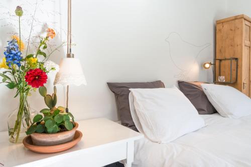 Postel nebo postele na pokoji v ubytování Bed en Breakfast Puur8a