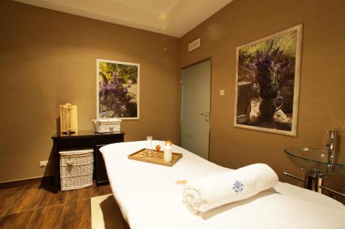 Ein Bett oder Betten in einem Zimmer der Unterkunft Versant Hotel & Spa
