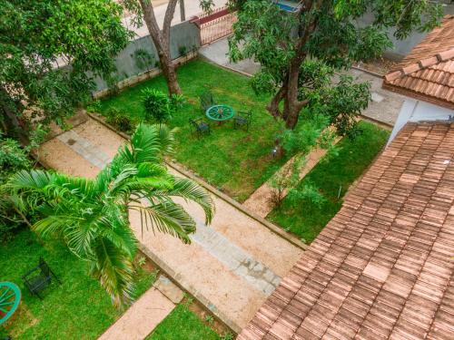 an overhead view of a garden with a palm tree at Thambu Illam in Jaffna