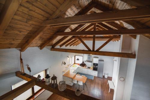an overhead view of a living room with wooden ceilings at Domček pod Roháčmi in Habovka