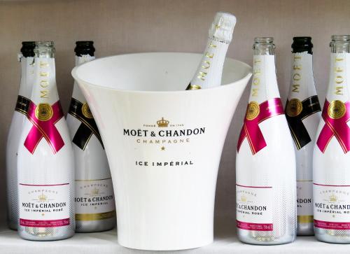 a group of bottles of wine in a bucket at Hotel Dischma - FREE BUS AND TRAIN TICKET in Lugano
