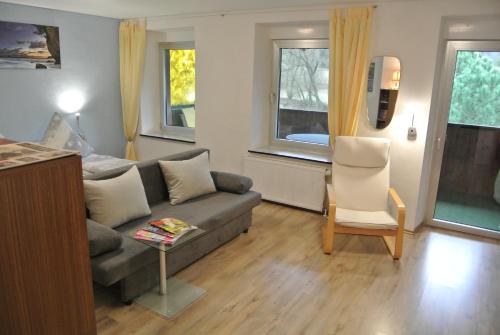 Χώρος καθιστικού στο Ferienwohnung zur Mühle