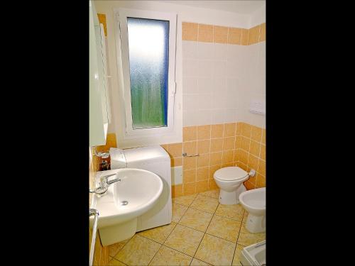 Koupelna v ubytování Residenze Mare e Pineta