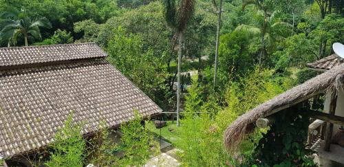an overhead view of a house and trees at Pousada Vertente das Águas in Lumiar