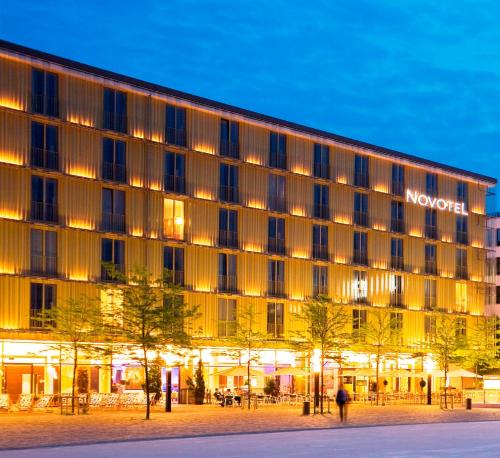 a rendering of the novotel hotel munich at night at Novotel München Messe in Munich