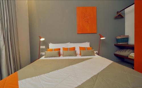 Postel nebo postele na pokoji v ubytování Rambutan Resort – Phnom Penh