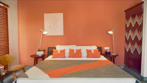 Postel nebo postele na pokoji v ubytování Rambutan Resort – Phnom Penh