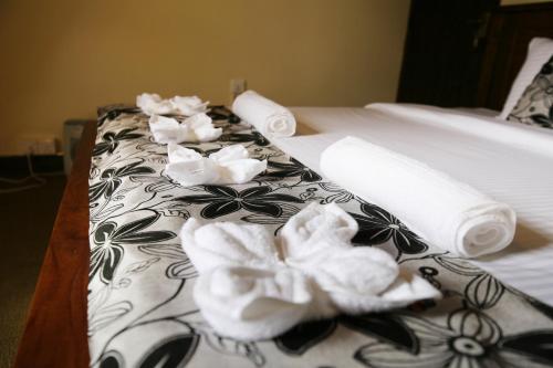 Una cama o camas en una habitación de The Hamlyn