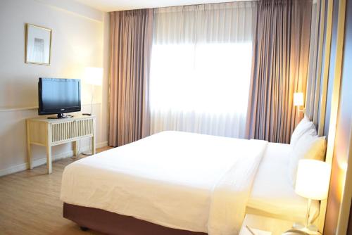 TV a/nebo společenská místnost v ubytování Trang Hotel Bangkok - SHA Plus