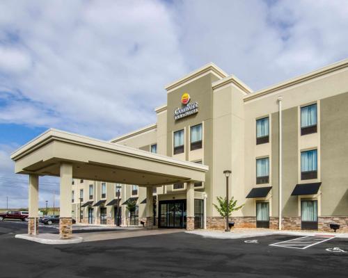 a rendering of a hotel building with a parking lot at Comfort Inn & Suites Lynchburg Airport - University Area in Lynchburg