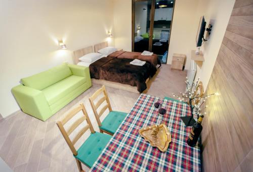 Ένα ή περισσότερα κρεβάτια σε δωμάτιο στο Cozy appartement, loft2 in New Gudauri