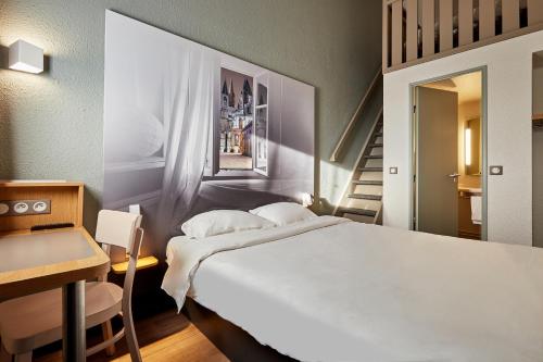 B&B HOTEL CAEN Sudにあるベッド