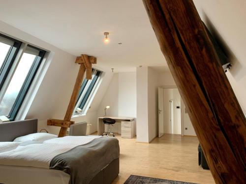 Cama o camas de una habitación en Altstadthotel Hayk am Rhein