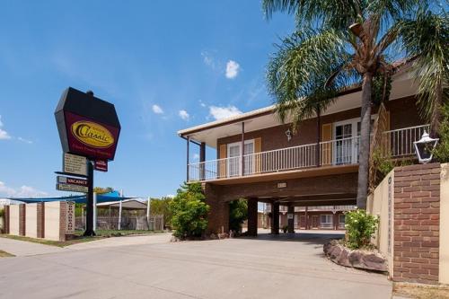 a mcdonalds sign in front of a building at Albury Classic Motor Inn in Albury